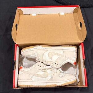 Nike Dunks in Cream and Orange